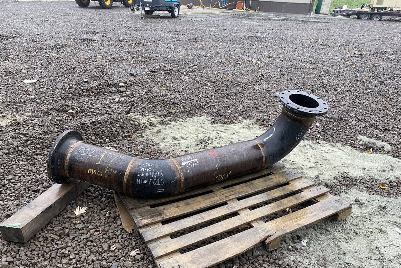 industrial painters before picture of a pipe